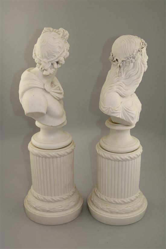 A pair of parian busts and columns, 19th century, 50cm and 48.5cm, slight losses to flowers